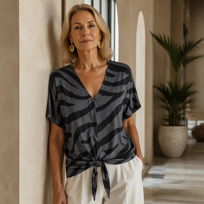 NURIA | CAMISETA DE CEBRA CON ESCOTE EN V Y NUDO